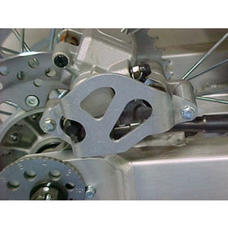 Works Connection Rear Brake Caliper Guard HONDA/SUZUKI/KAWASAKI CR125 95-97, CR250 95-96, DRZ400 00-08, RM125/250 96-00, KLX400 03-04