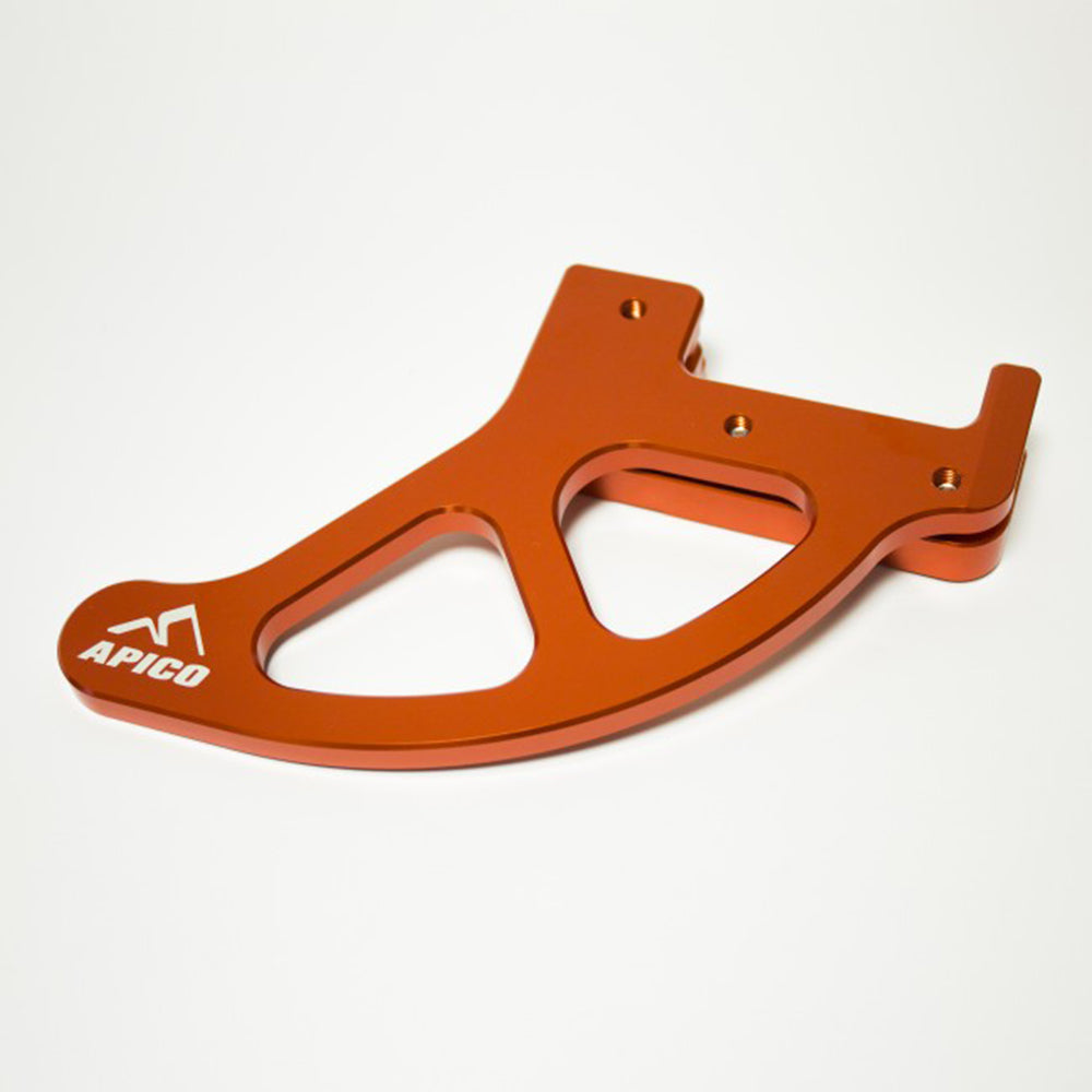Apico Rear Disc Guard KTM/HQV/GAS/SHE SX/SX-F/FC 04-23, EXC/EXC-F/TC 04-23, TE/FE 11-18, MC/MC-F 21-23 Orange Brembo